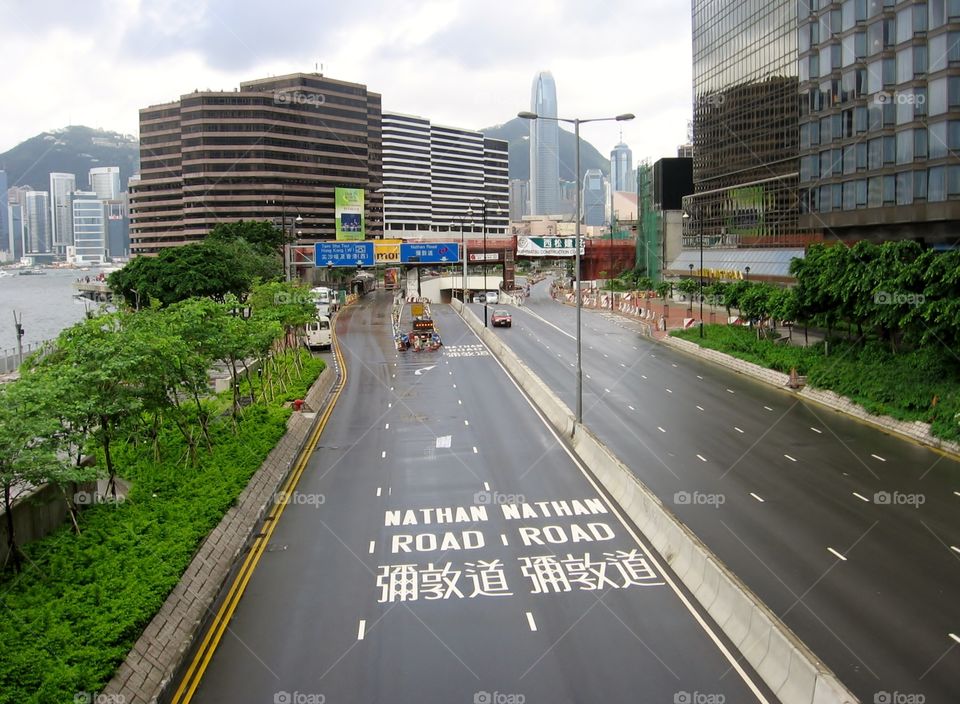 On Nathan Road. Hong Kong Skyline in the Background