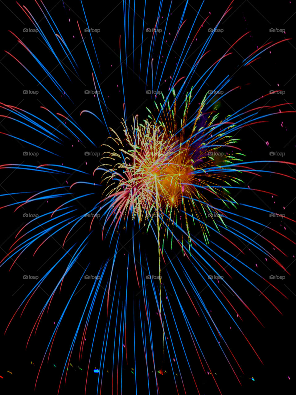 Low angle view of fireworks during night