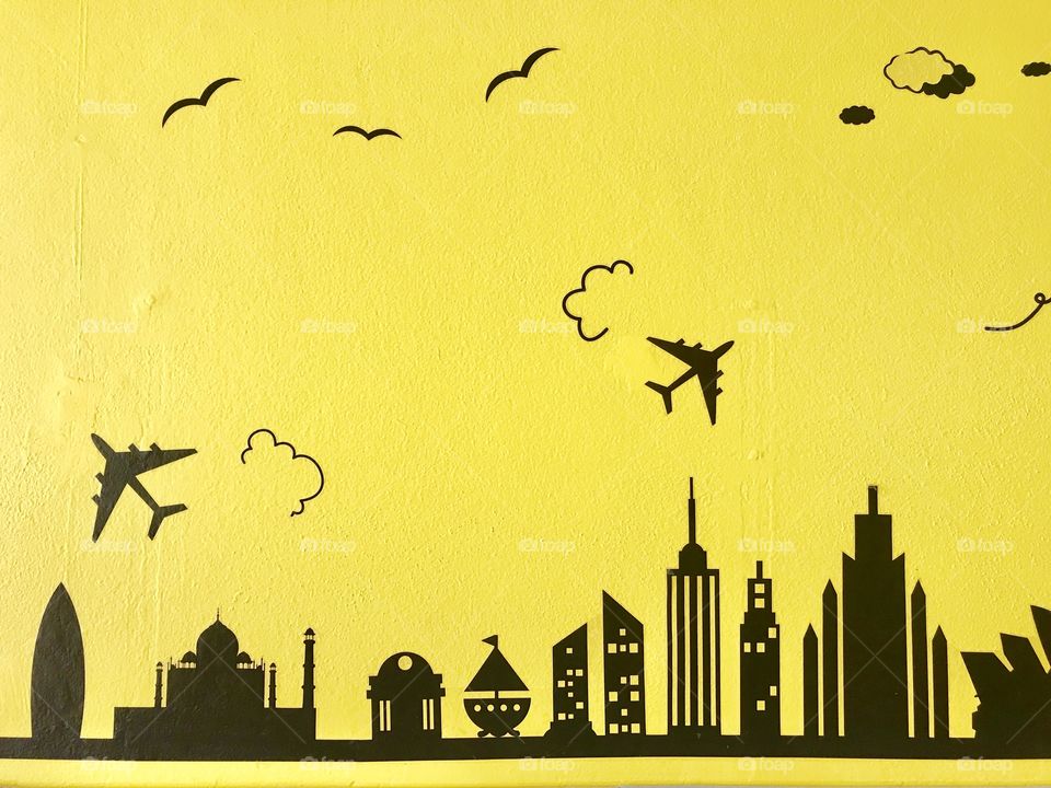 Cityscape on yellow wall background