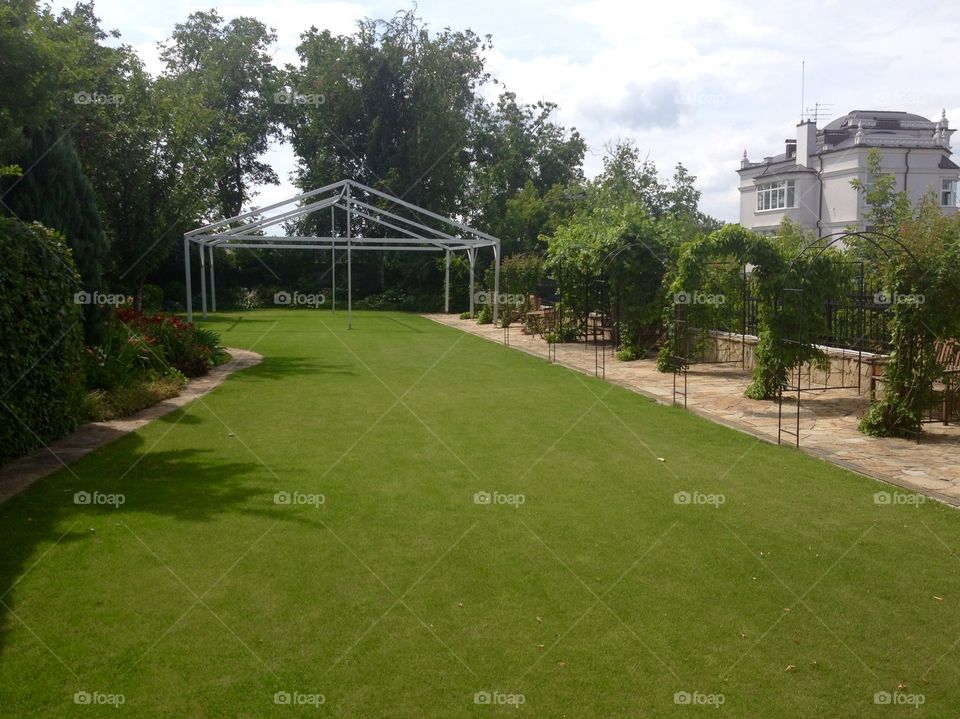 Courtyard of a residence with a summer pavilion construction