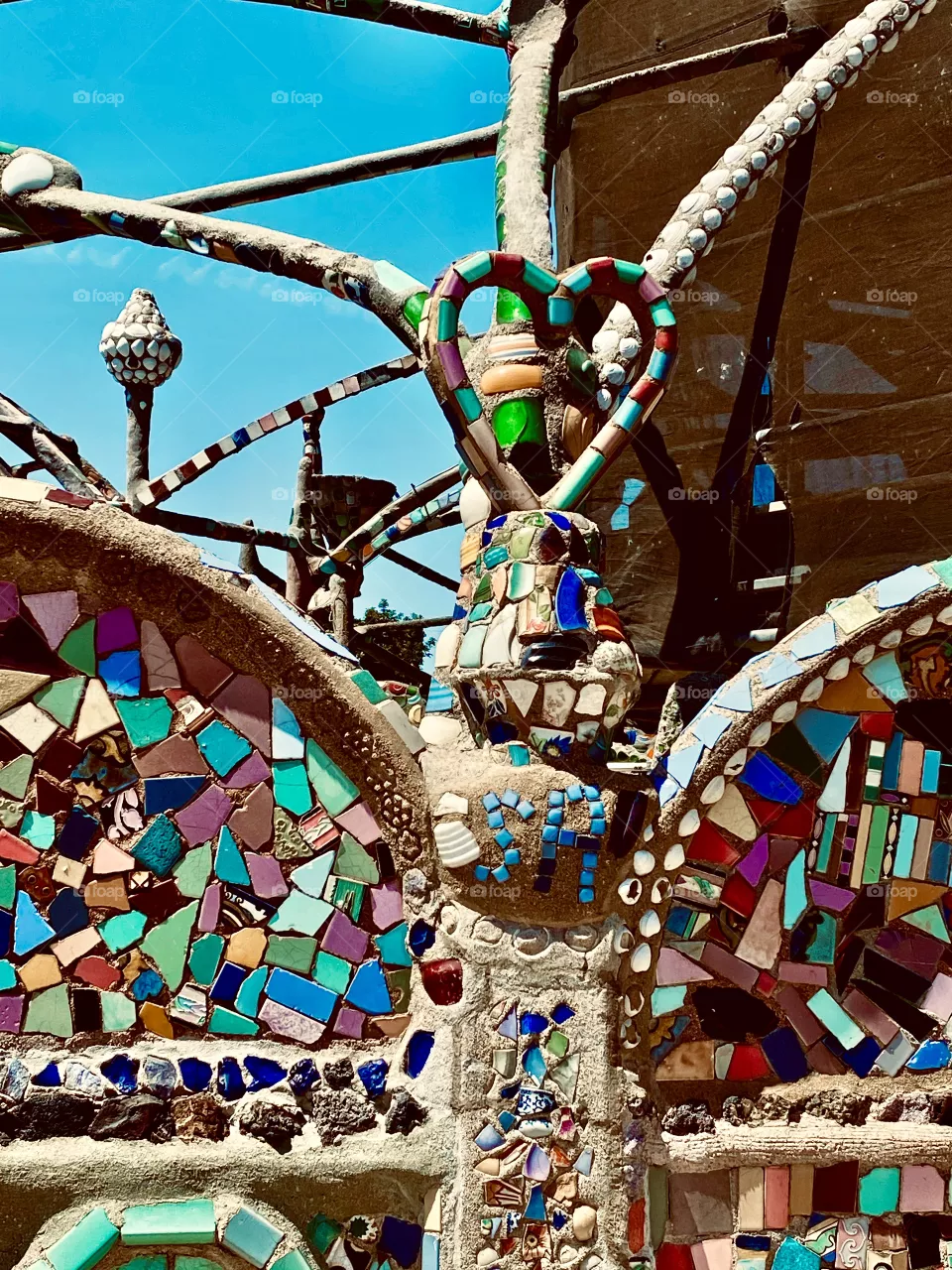 WATTS California.  Amazing art.  Took 30 years to complete.   Amazing all recycled pieces of glass, Iron, Anythimg he could fined along the street between 1923 - 1951