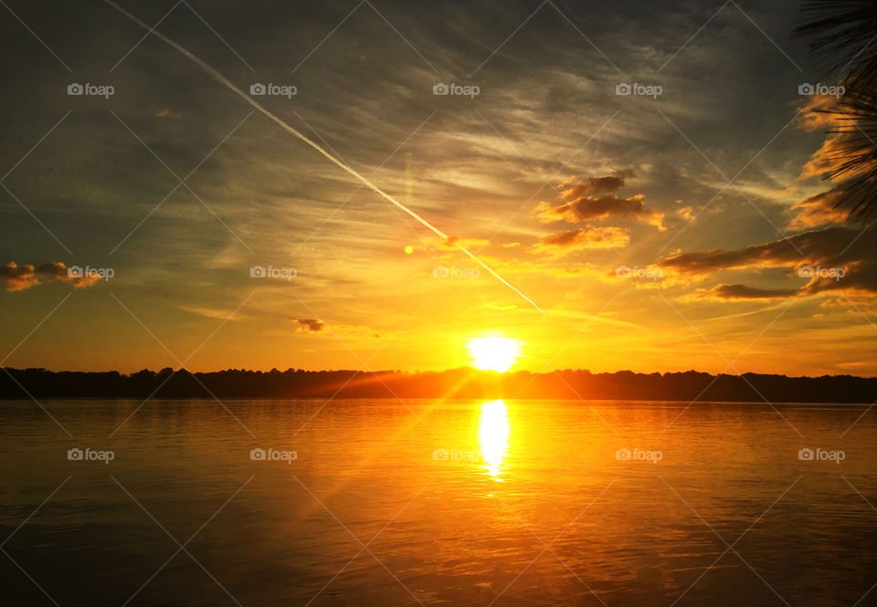 Sun reflecting on lake