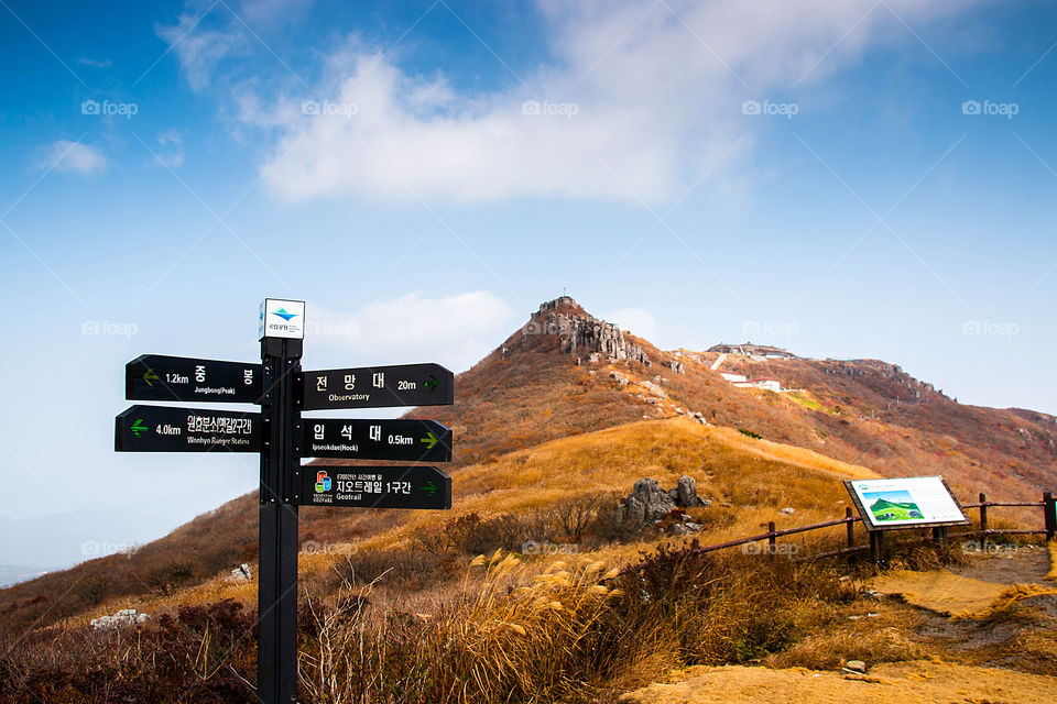 Direction sign, this photo was taken at Mudeungsan national park, Gwangju, South Korea. This is very famous for hiking and adventure view.