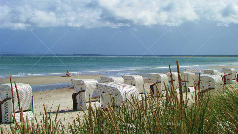 germany beach ocean clouds by kersti