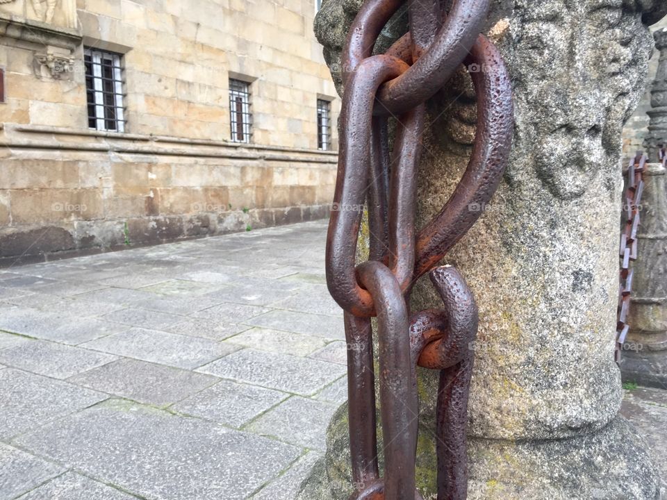 Iron chain in a street, Spain
