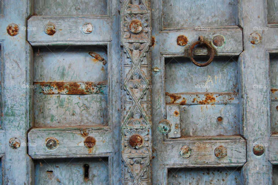 Closeup on a worn door in Stonetown on Zanzibar.