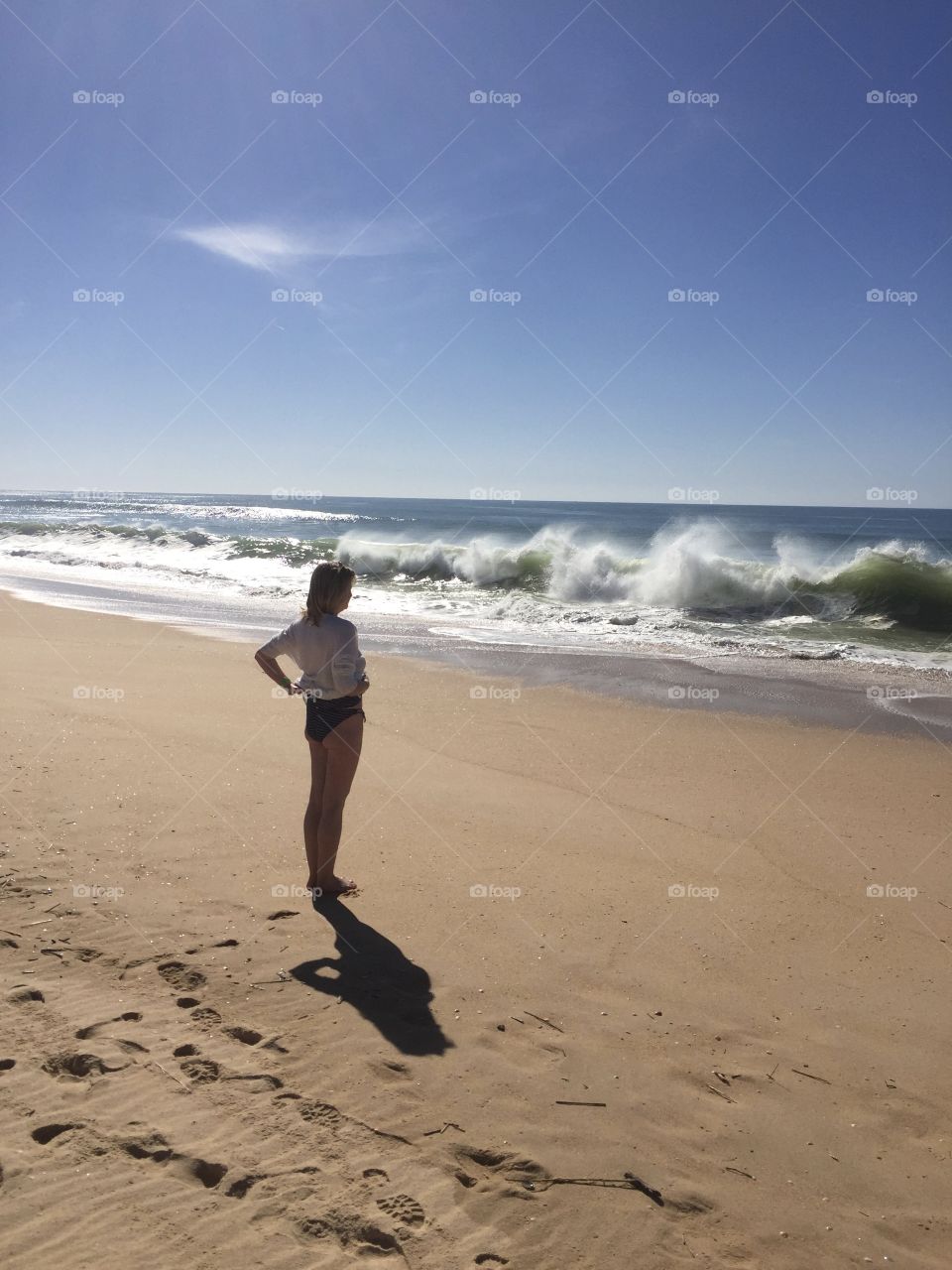 you are so small in front of the expanse of the sea