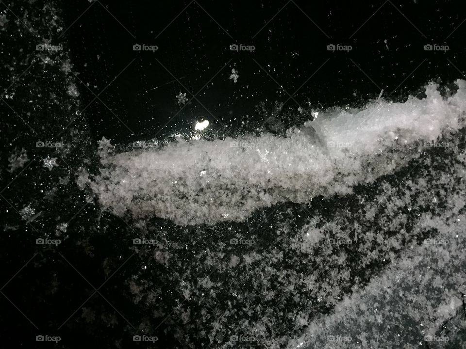 Snowflakes. 
Very wet snowfall with large visible flakes. Had to photograph the designs. 
Pittsford, NY