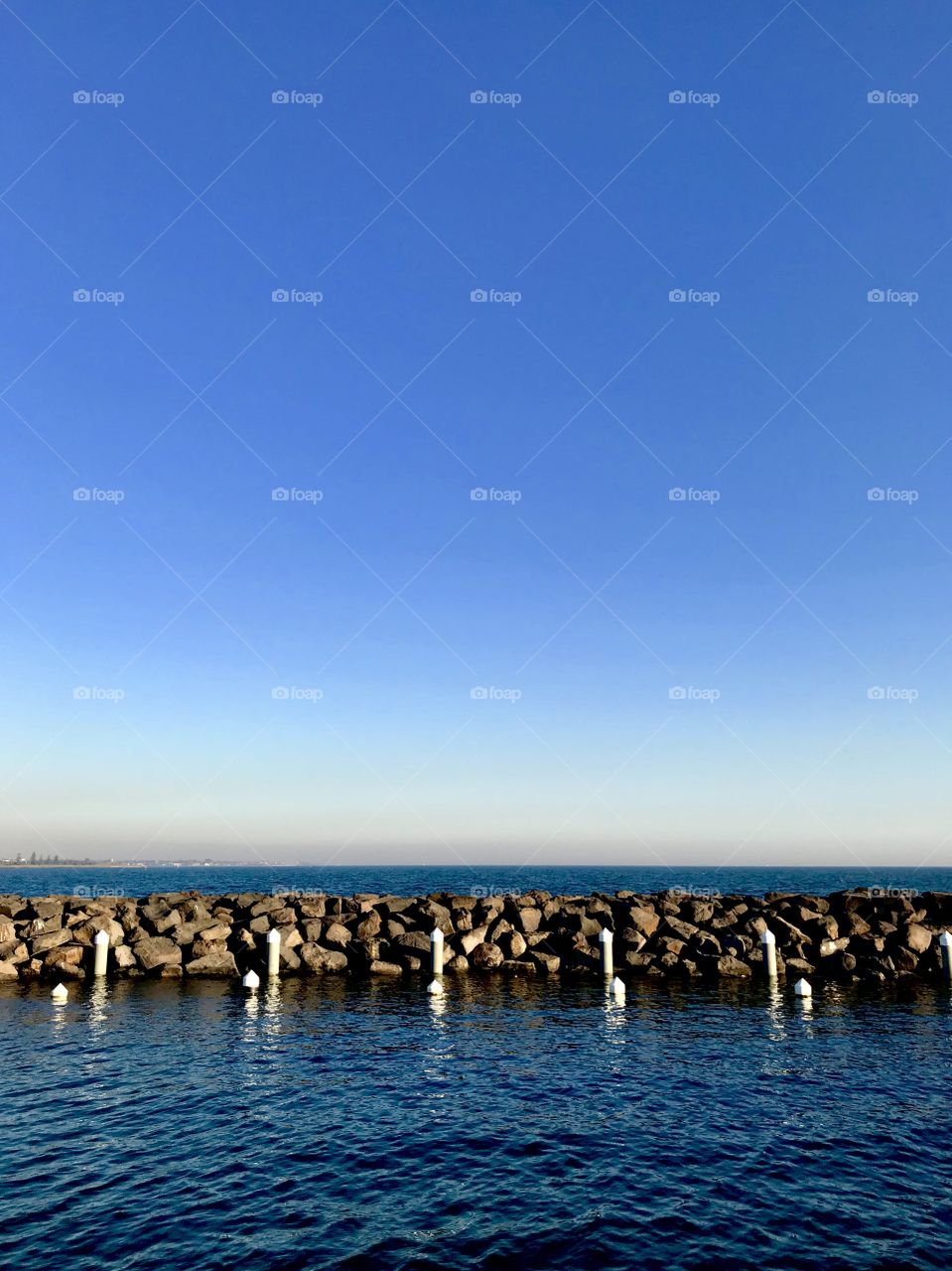 Rocks, pier, barrier, on the ocean 