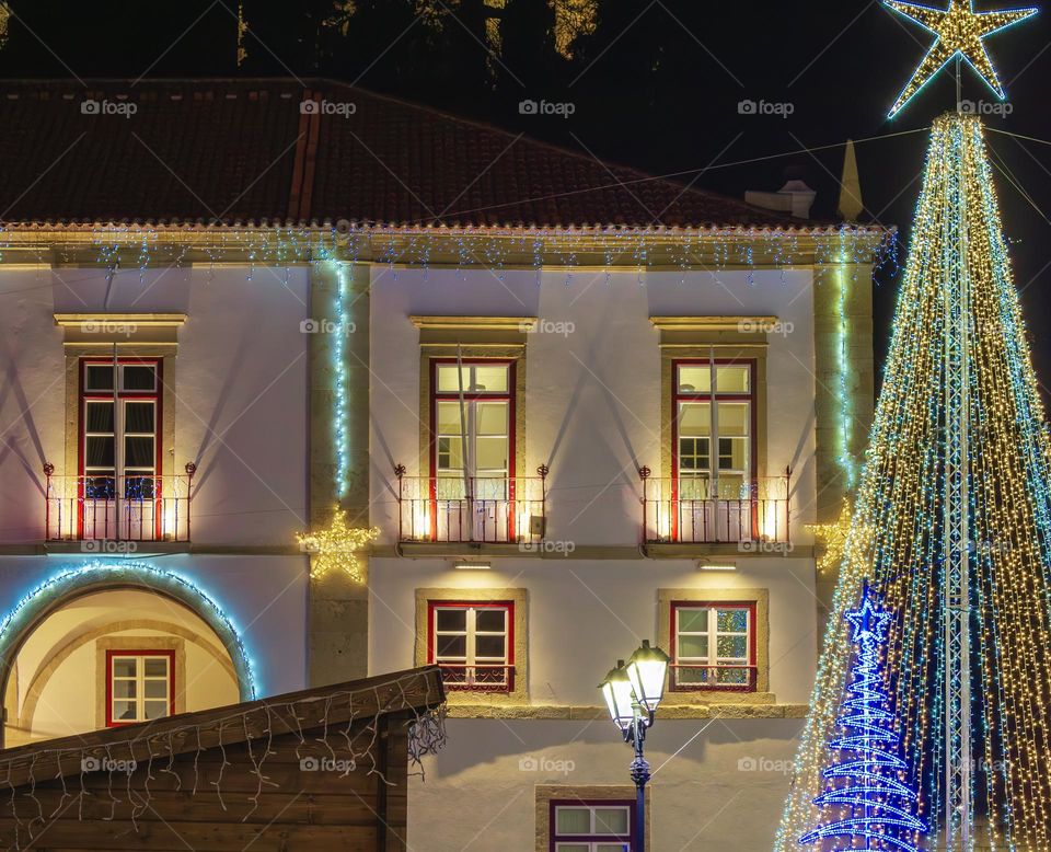 Town Hall offices lit up with Christmas lights.