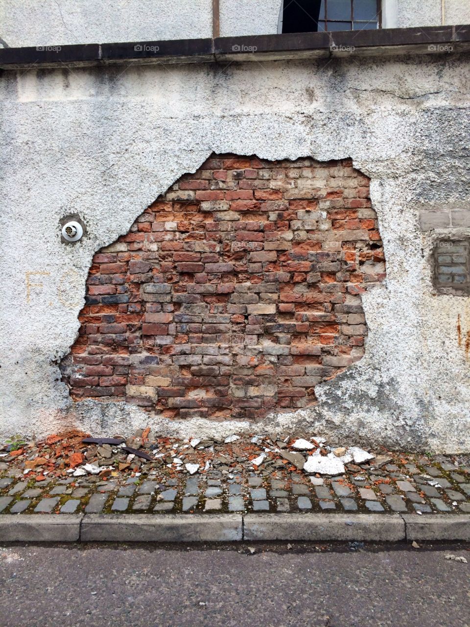 There's Bricks Behind. An old wall in my home town, crumbling to reveal the bricks underneath. 
