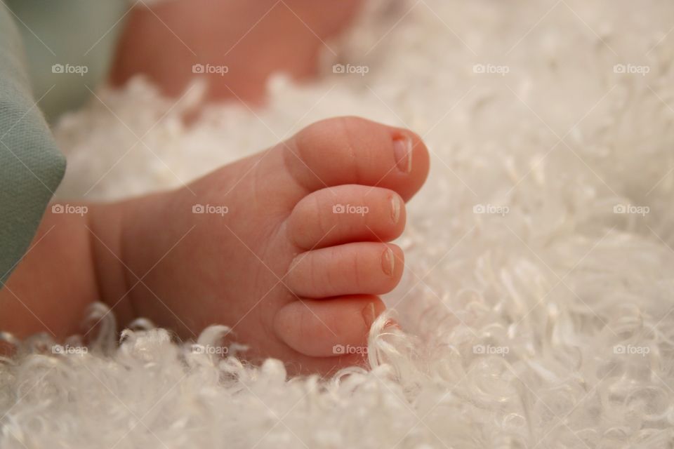 Close-up new born baby feet
