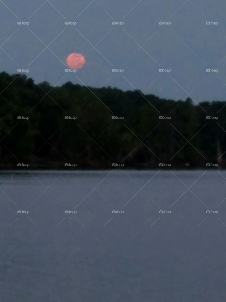 morning moon over lake.