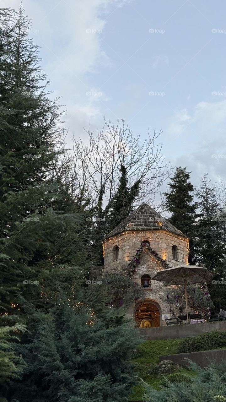 A church in the woods next to the forest in Christmas   
