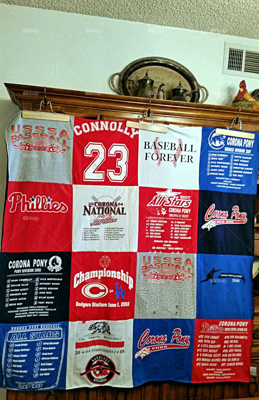 T-shirts from a few of the teams my grandson played on recycled into a memory quilt!