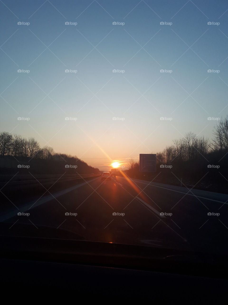 Highway ride by sunrise