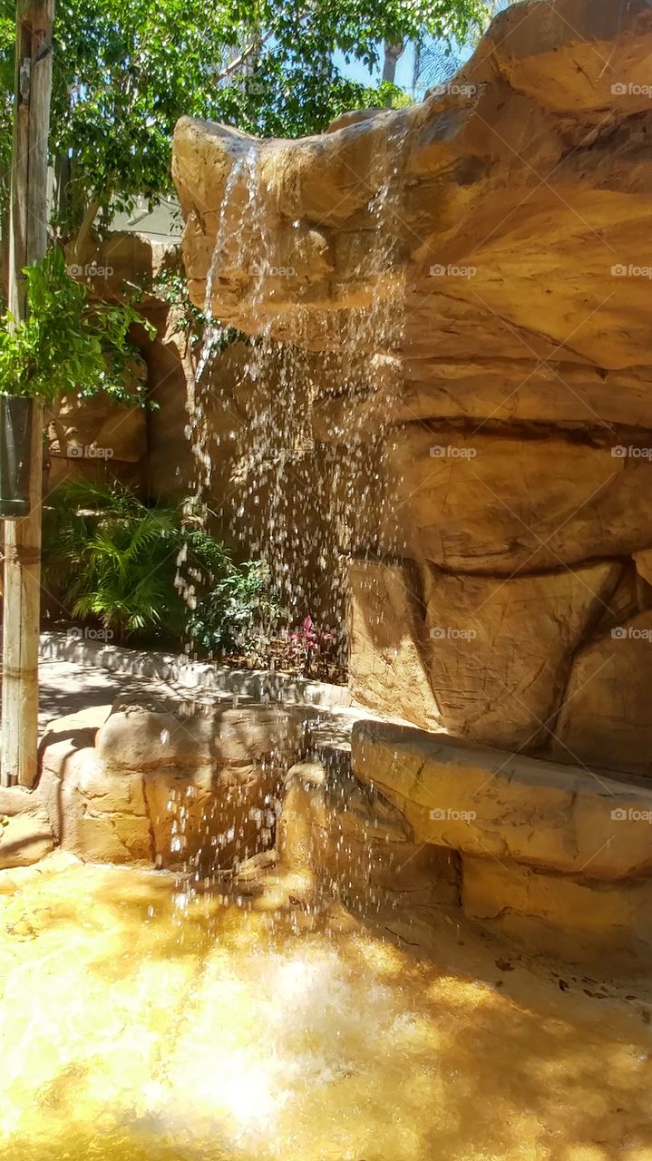 water in motion : waterfall in sunlight
