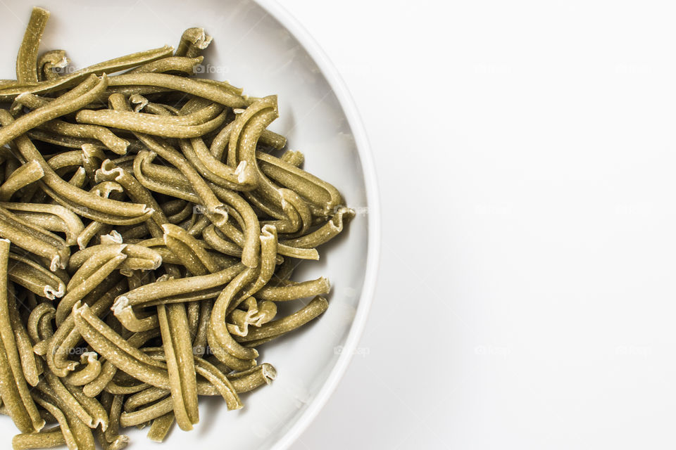 Close-up of raw green pasta