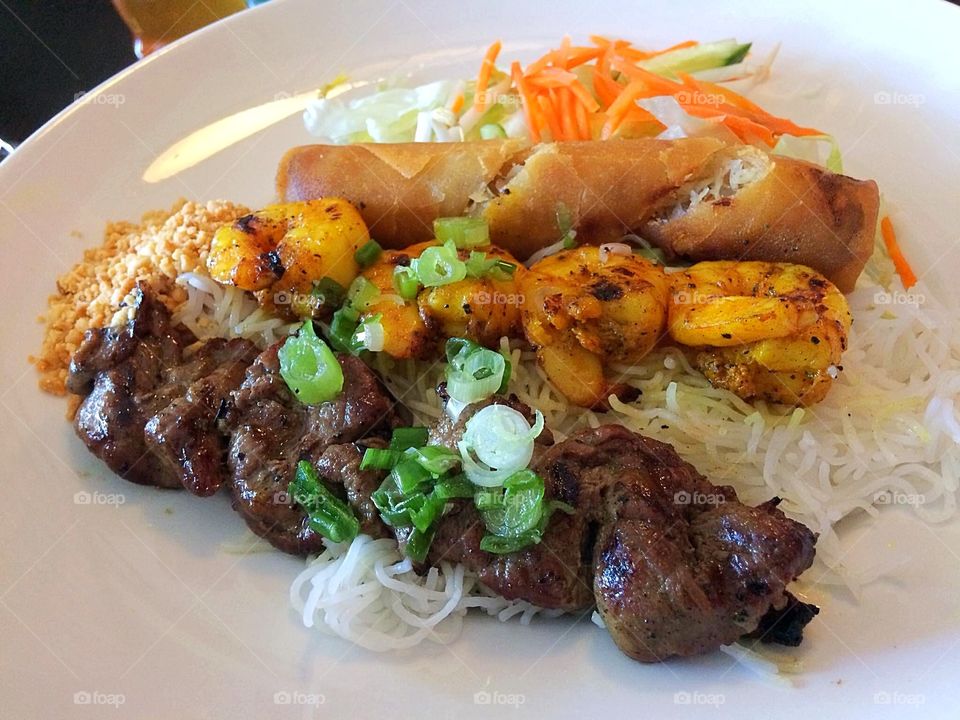 Beef and shrimp on vermicelli 
