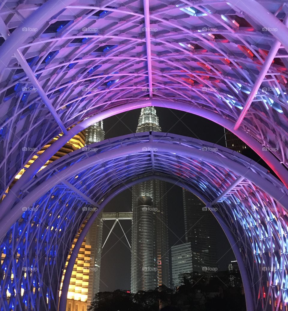 The lookthrough. Pintasan Saloma or Saloma Link is the new iconic landmark in Kuala Lumpur City. Connecting two different world of Malay village with the major skyscrapping city Kuala Lumpur. Feels like walking through a time tunnel