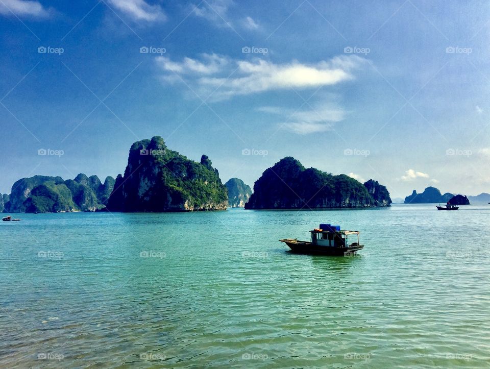 Limestones and a boat in Vietnam 