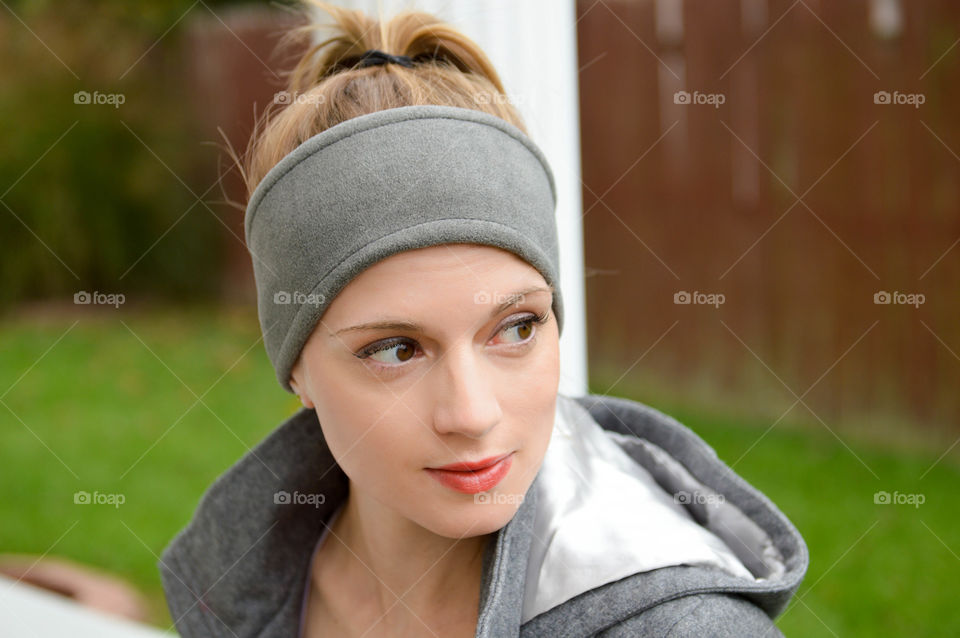 Woman wearing a fleece headband outdoors