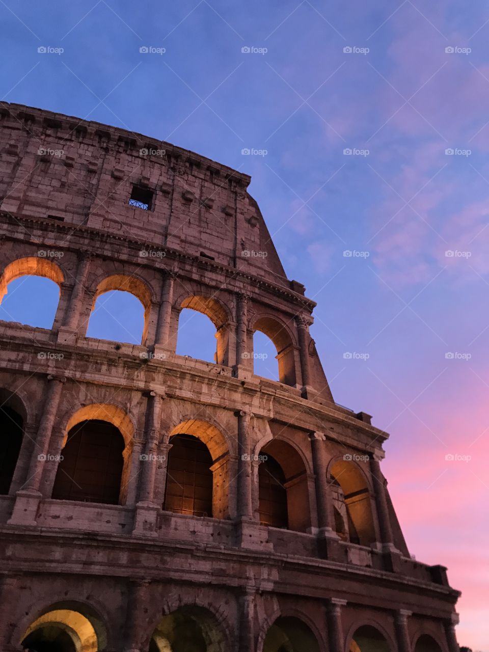 The ancient Colosseum of Rome.