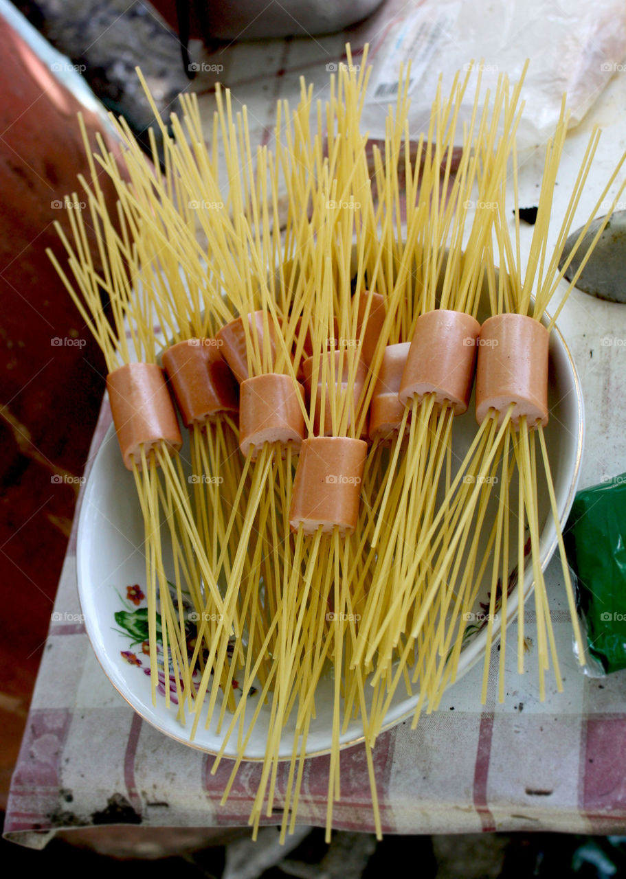 Raw spaghetti in frankfurter, home made