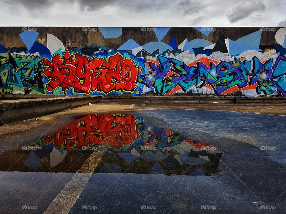 urban playground, colorful vivid street art graffiti reflection