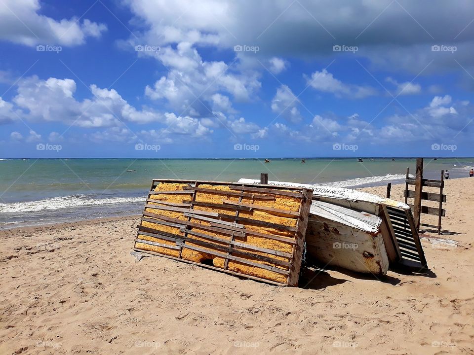 Handmade raft of the fishermen of the beach of Candeias. The simplicity and strange rustic beauty.
