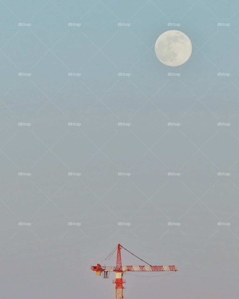 Tower crane and moon