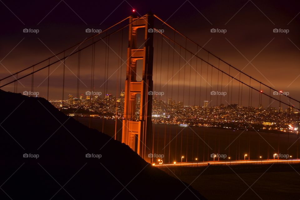 night shot of Golden Gate Bridge 