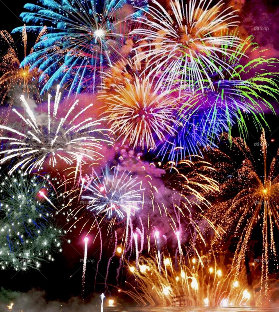 Multicolored firework explosions.