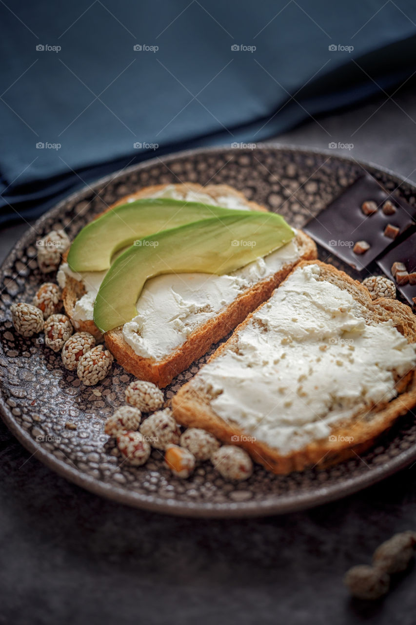 Toasts with cream cheese and avocado 