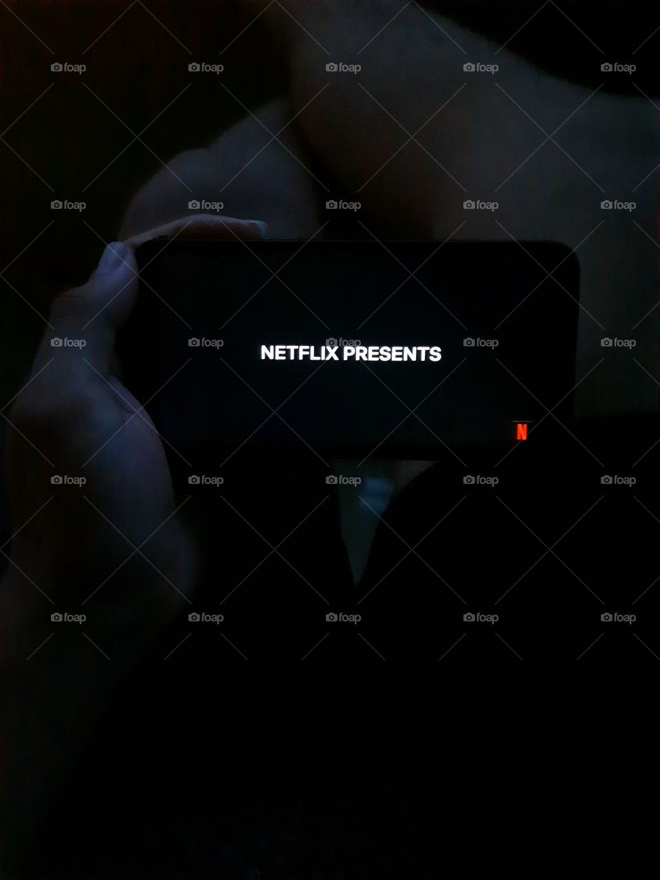 Netflix and Chill.... Watching netflix on mobile.. Evening chill time... enjoying alone... new series or new trailer...
