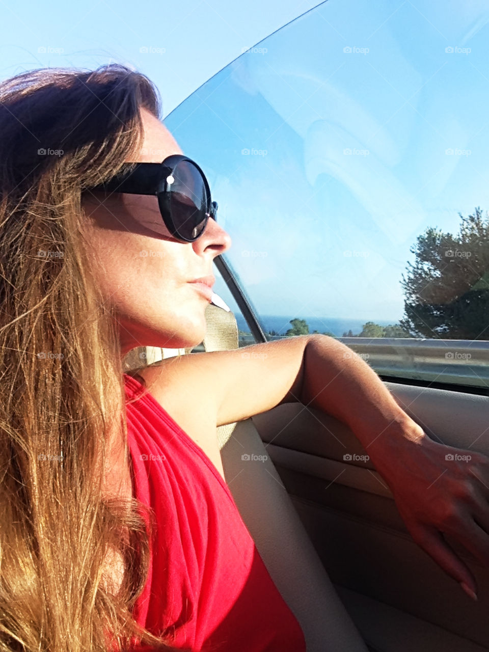 Summer traveling in cabriolet by the seaside 