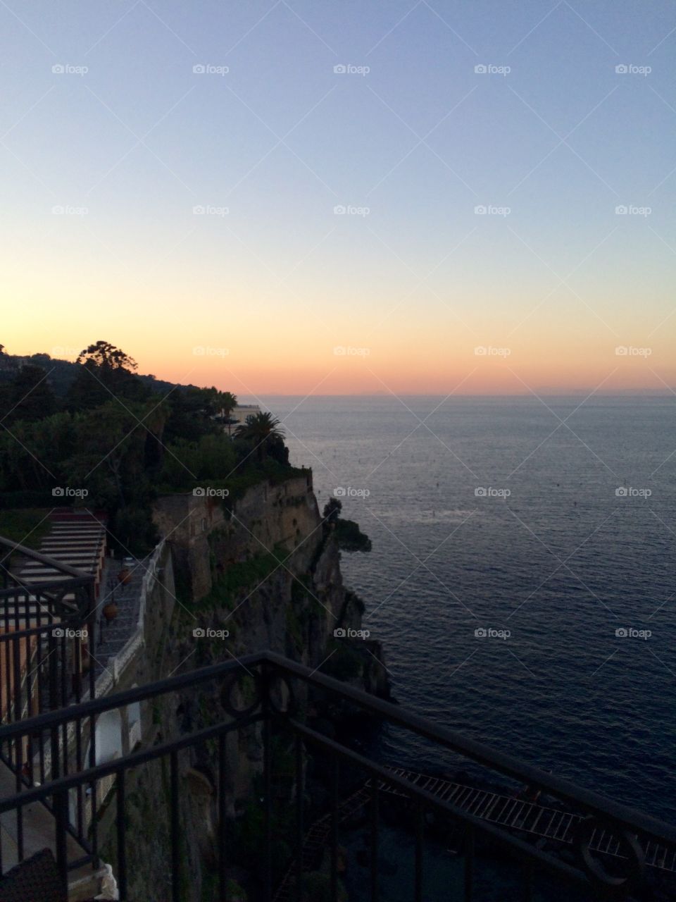 Sunset Beyond the Ruins. Taken from our balcony at Hotel Bellevue Syrene in Sorrento Italy. 