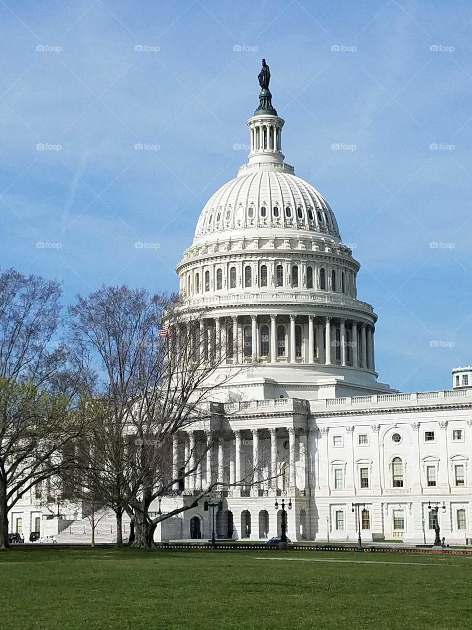The United States Capitol building on a sunny day in Washington, DC. Photo taken April 2018.