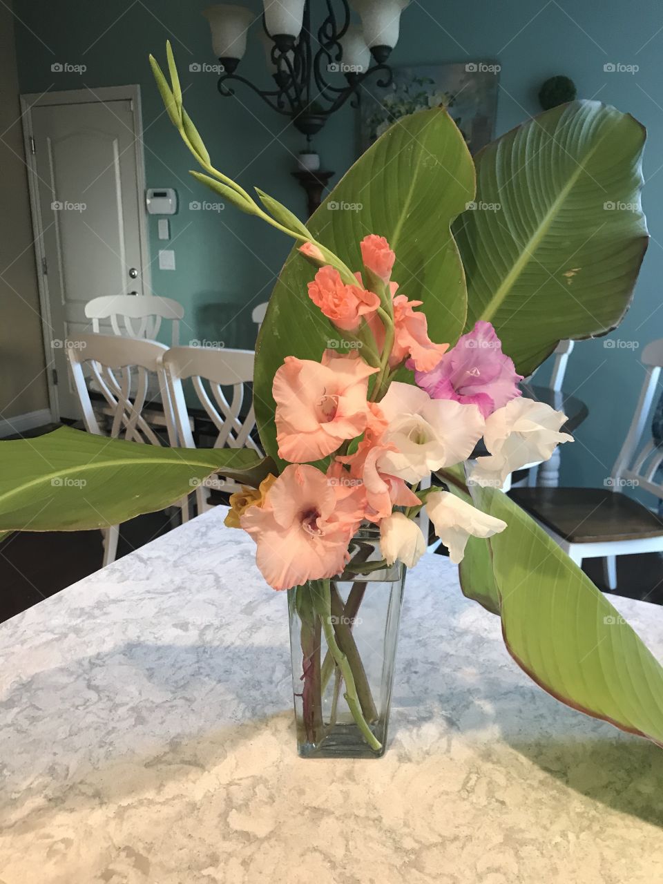 Glads, roses and canna leaves 