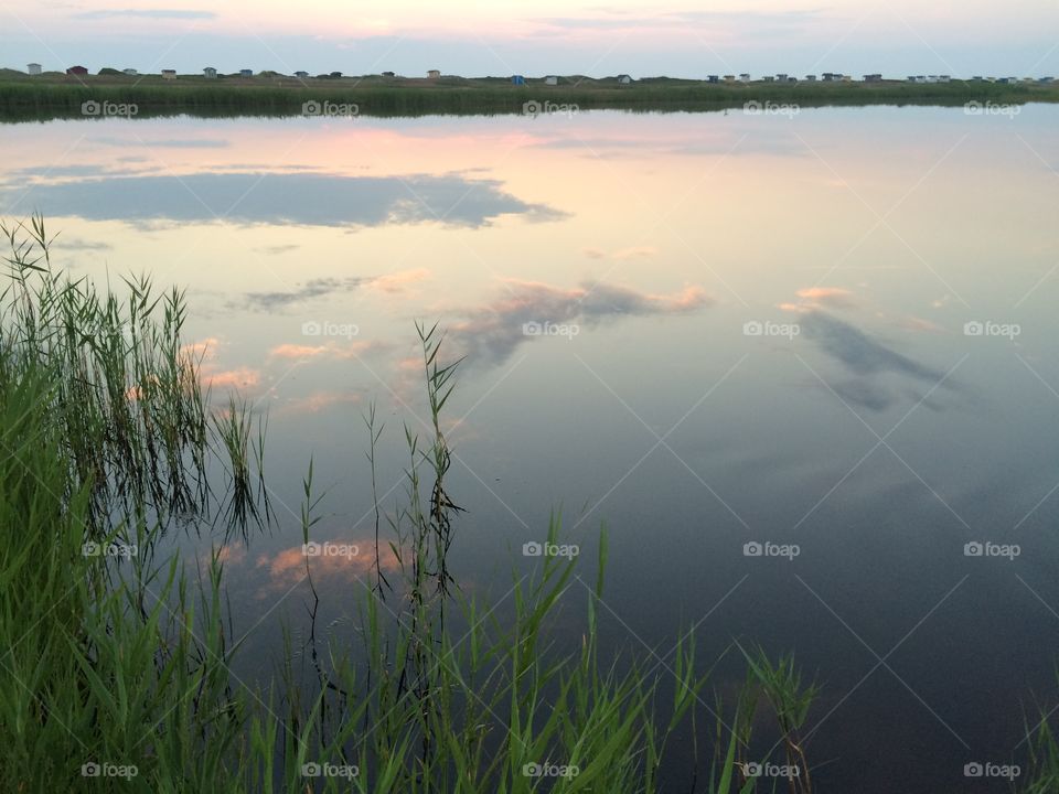 Scenic view of lake during sunset