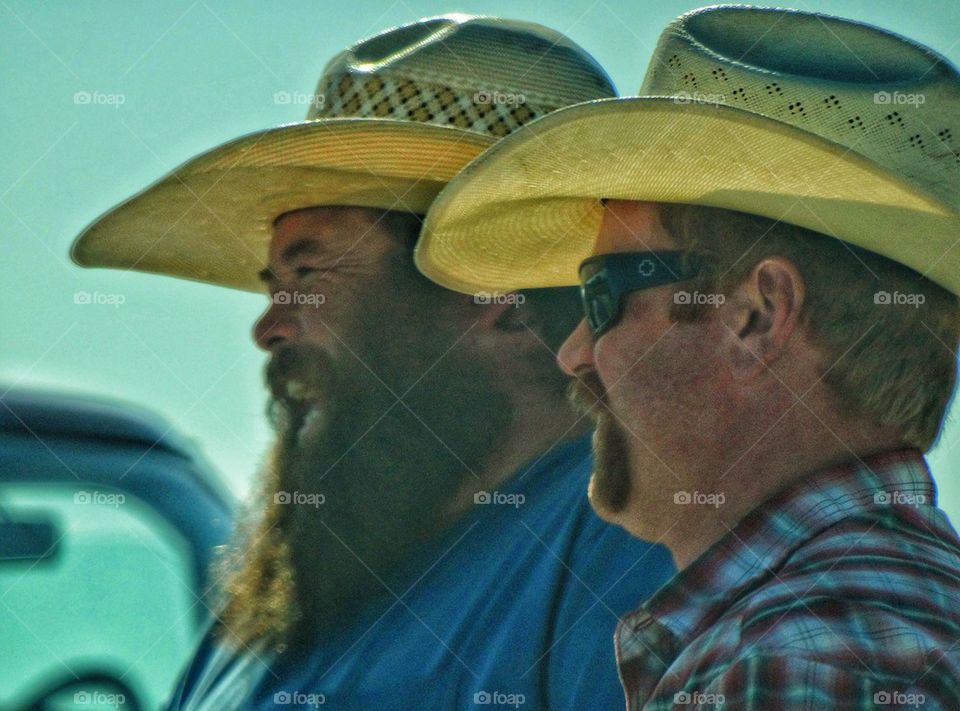 American Cowboys. Two Cowboy Brothers Smiling

