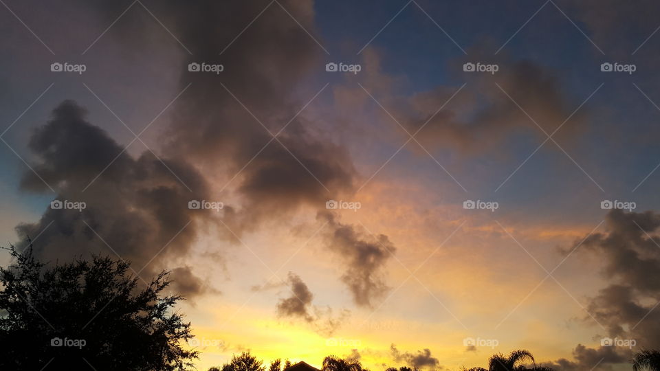 Close-up of black clouds during sunset