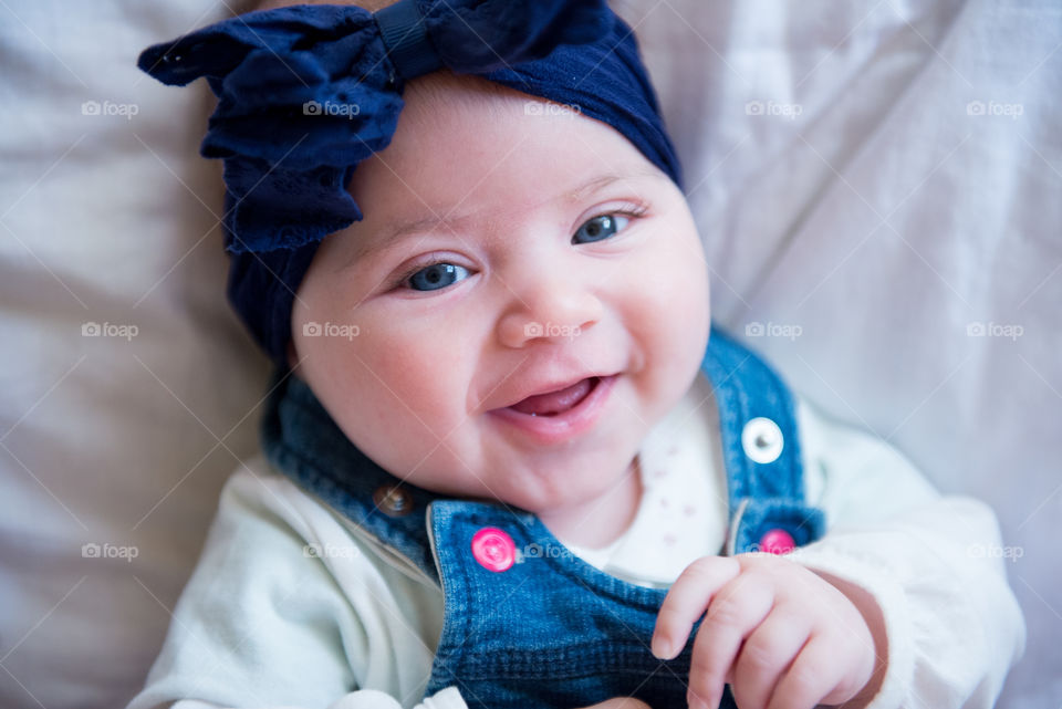 Cute baby with a bow