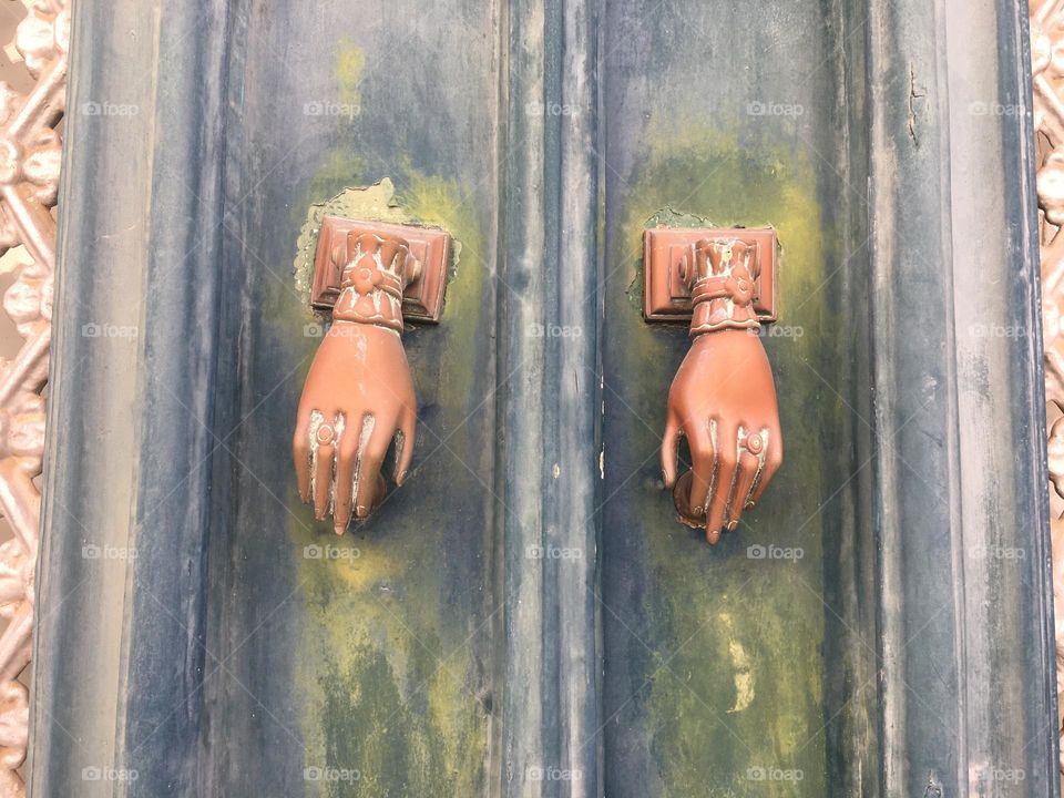 Traditional hands on door