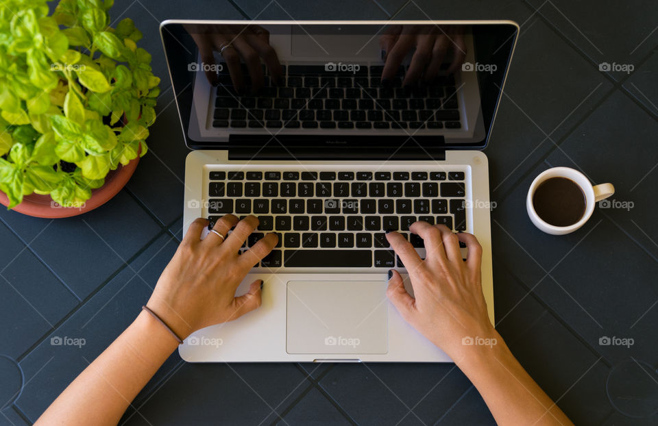 Woman while working on the desk