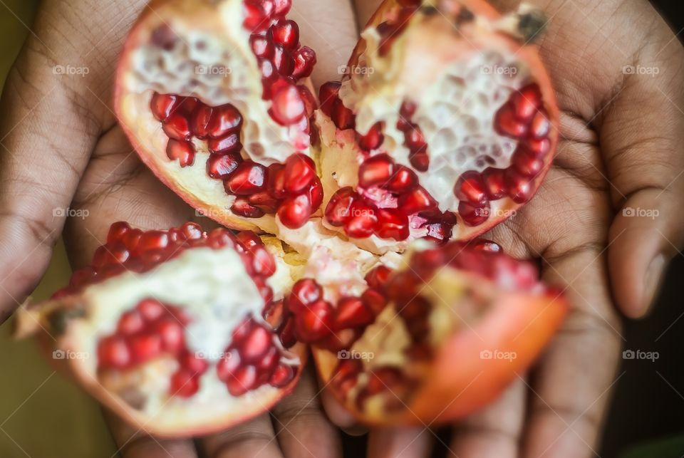 Extreme close-up of pomegranate seeds