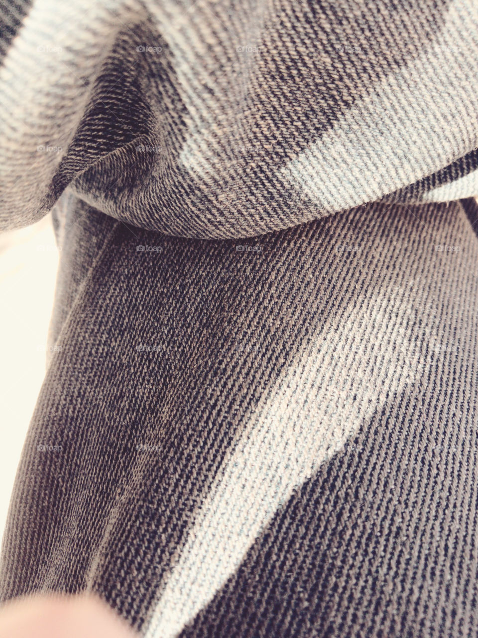 Beautiful detailed look of a grey looking Jean fabric.