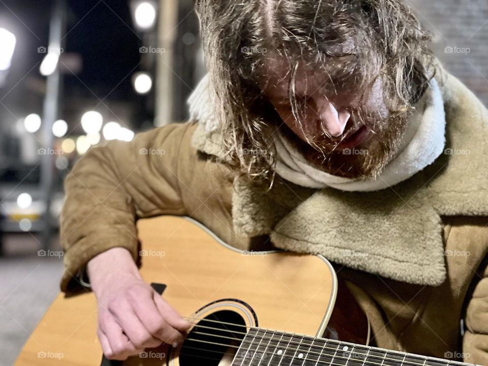 Playing guitar on the street 