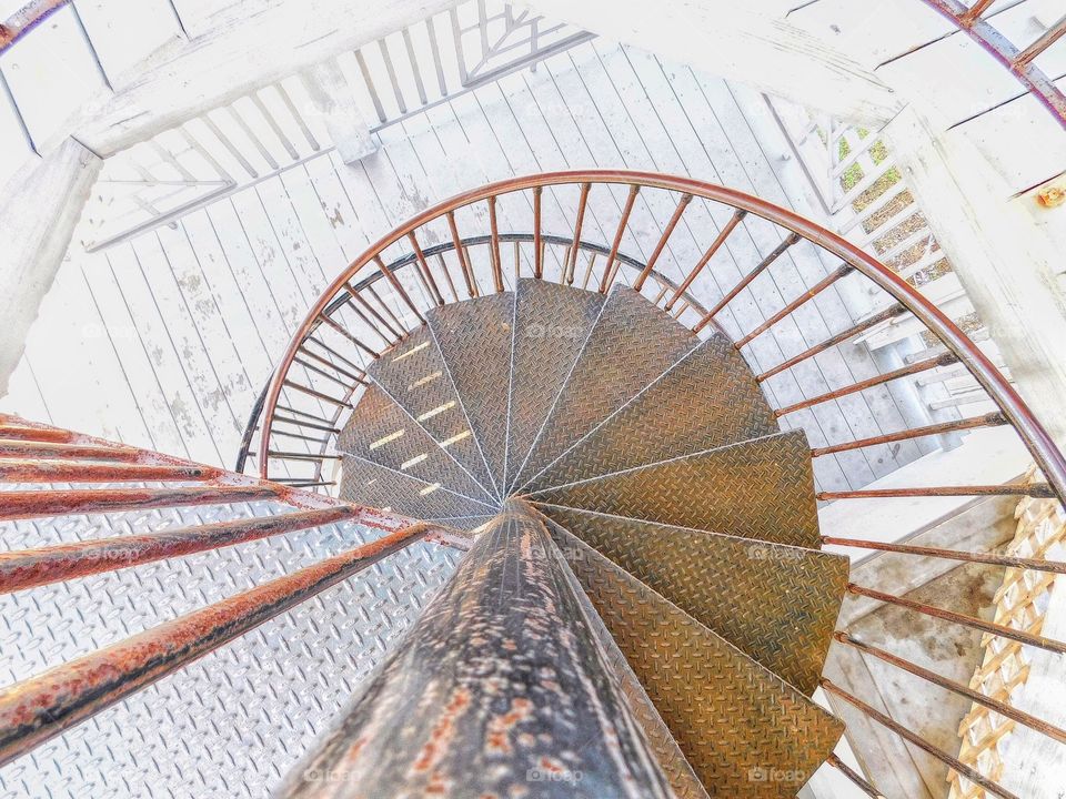 Spiral of Theodorus, rusty metal staircase 