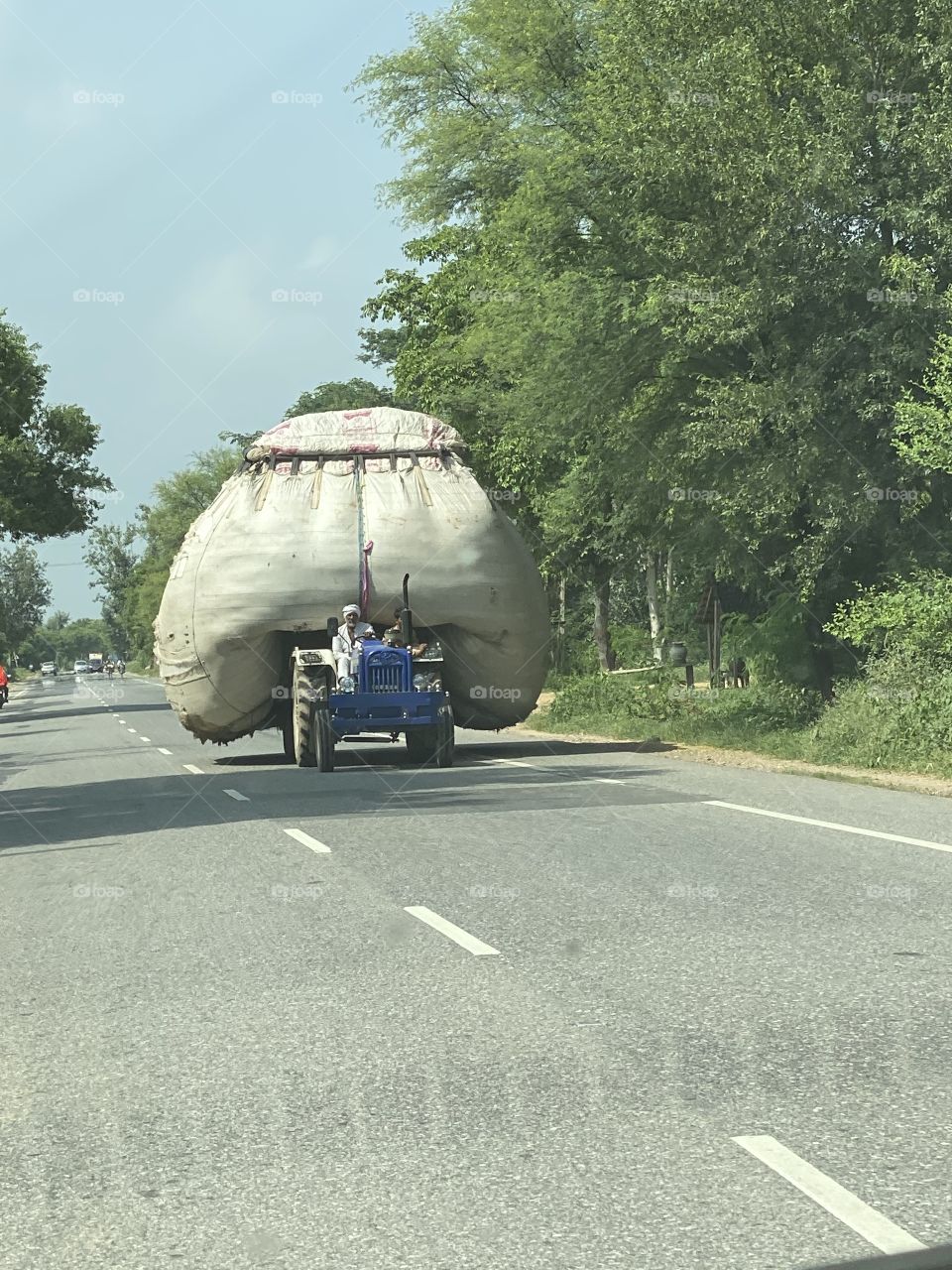 A small tractor but had huge load